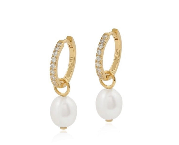 Gold vermeil hoop earrings with pearl drops on a white background
